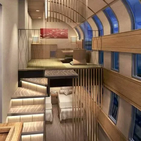 Deluxe Suite Shiki-Shima sur deux niveaux — chambre en mezzanine et salon au rez-de-chaussée dans le train de luxe japonais